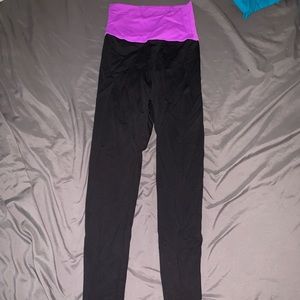 black leggings with purple waistband